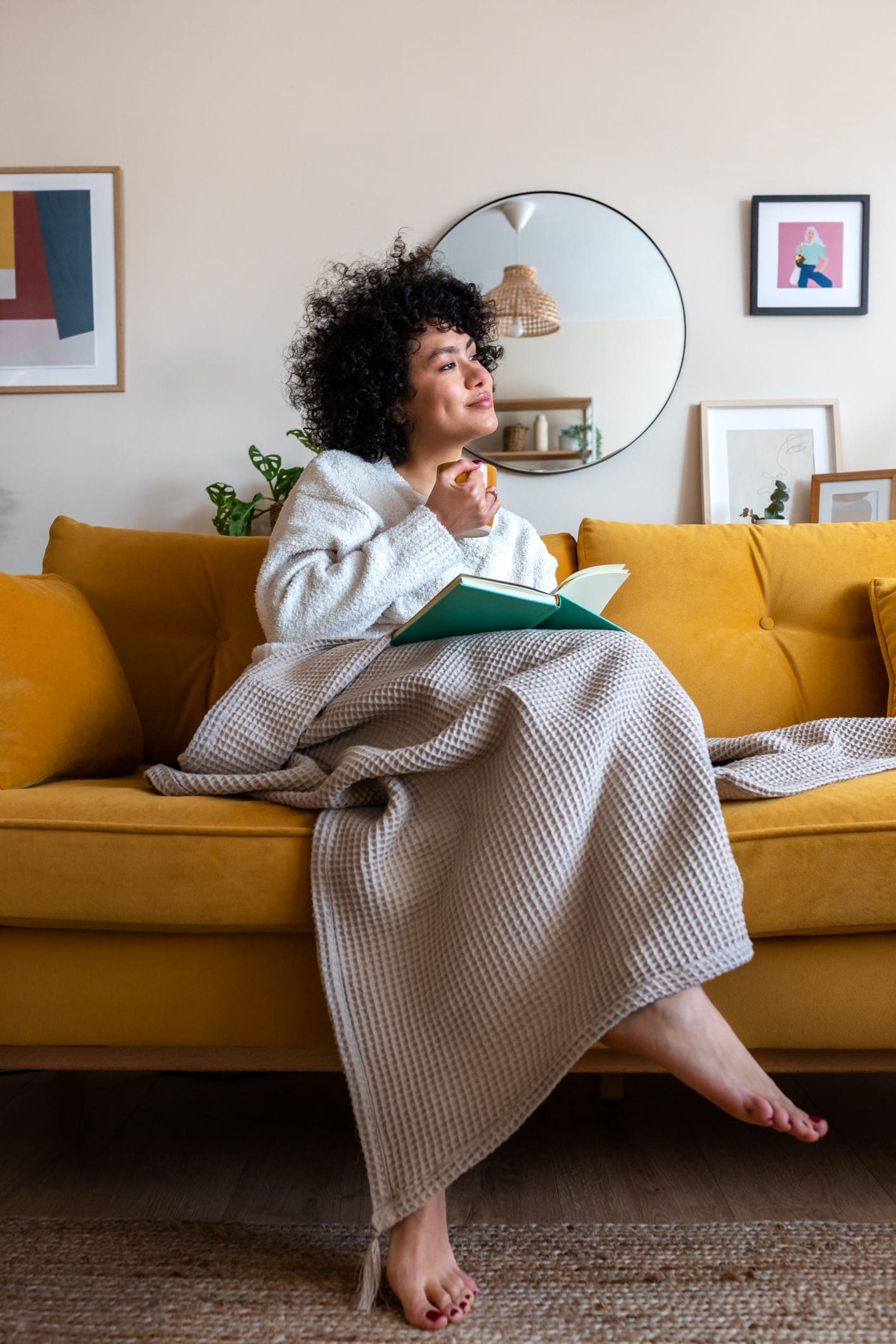 Relaxed woman at home enjoying a calm moment after anxiety therapy