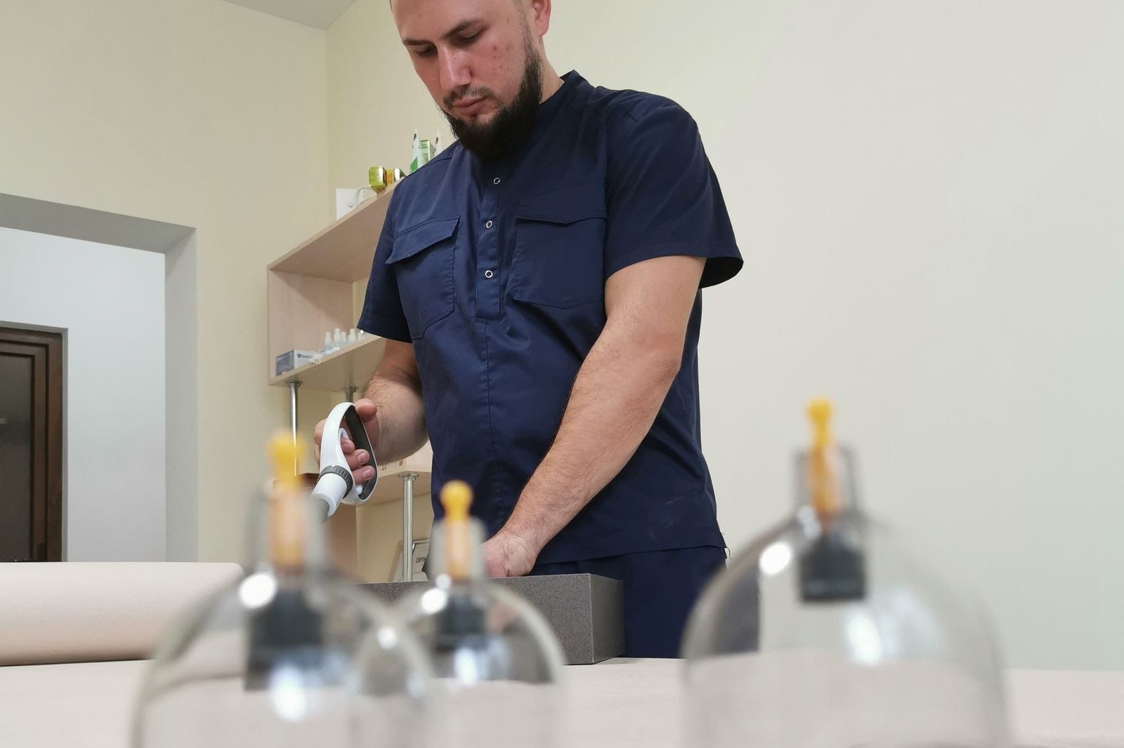 Glass cupping therapy cups arranged for treatment