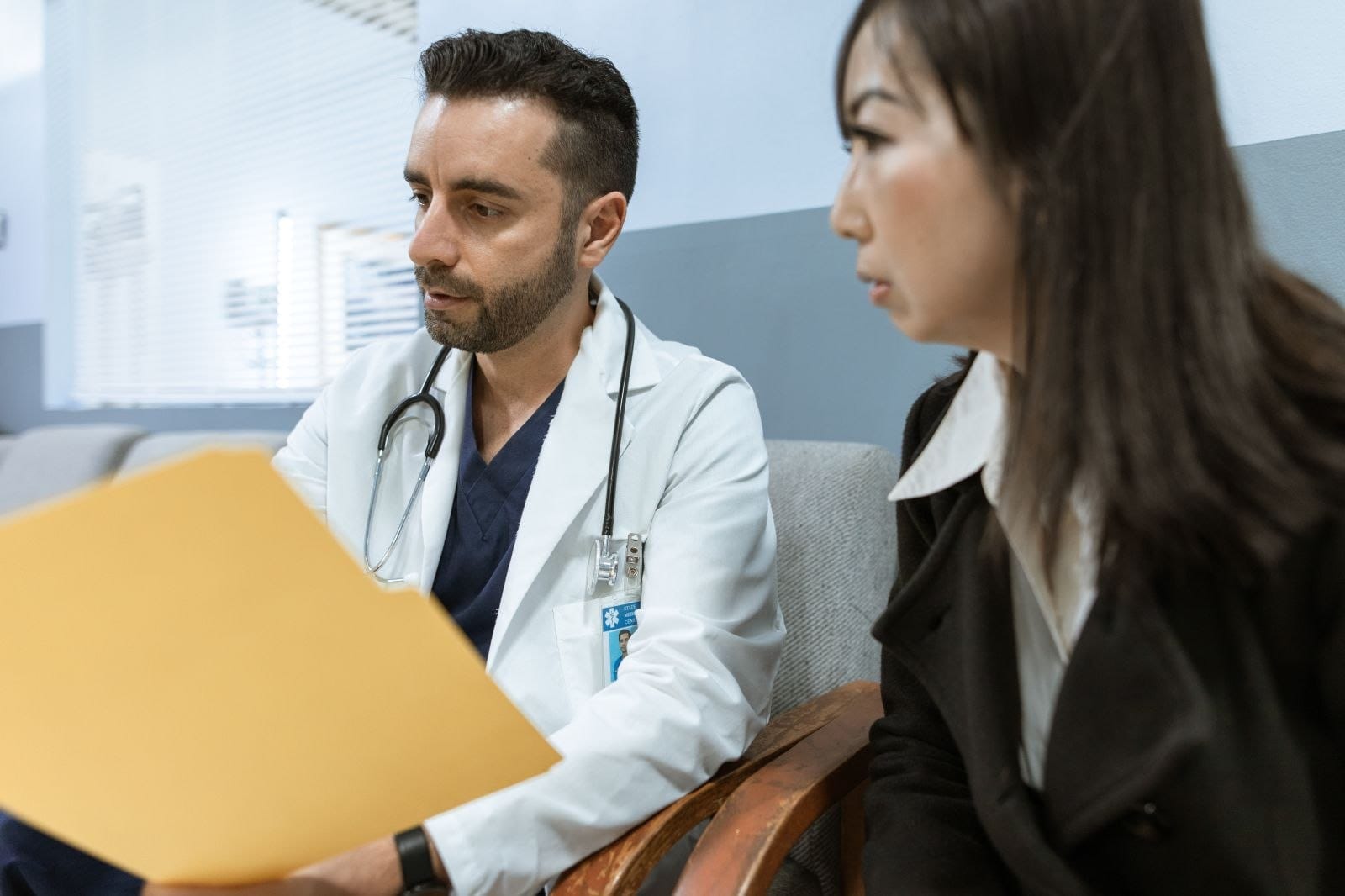 Naturopathic doctor reviewing results with a client during intake