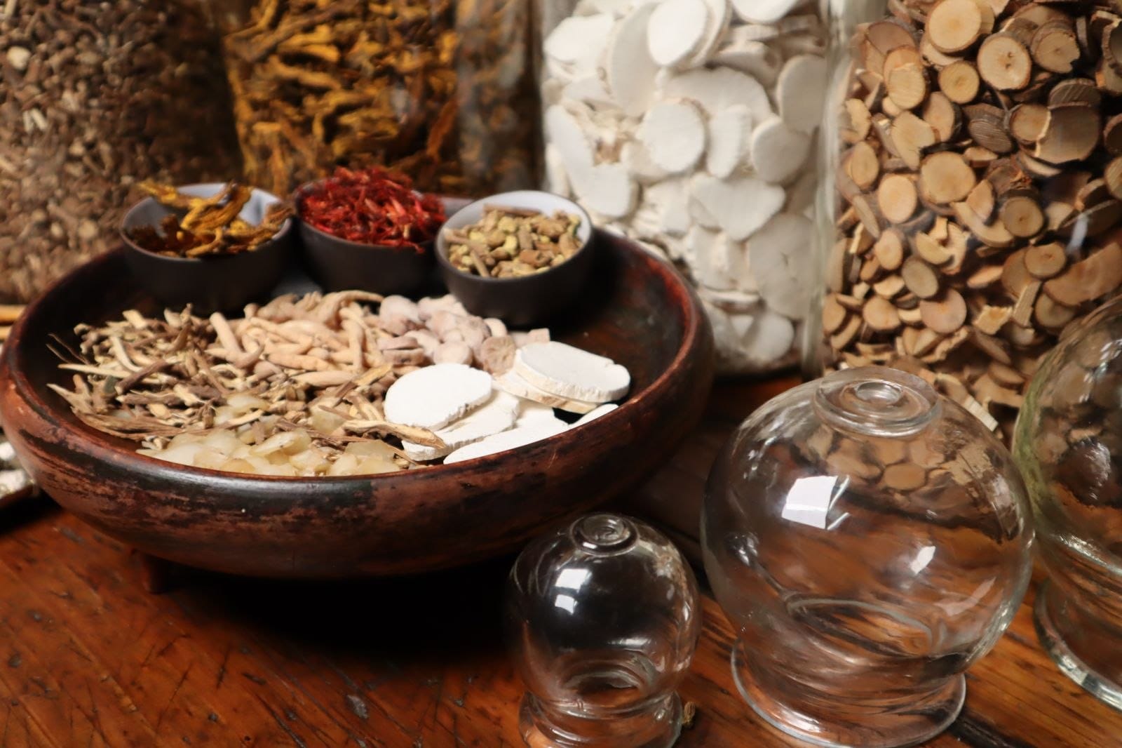 Traditional Chinese Medicine herbs and cupping glasses